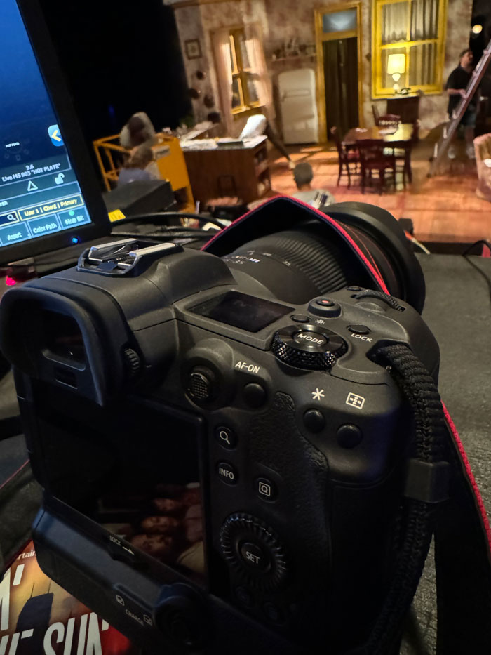 My Canon R5 with the RF 24-70 mounted, sitting on a tech table
