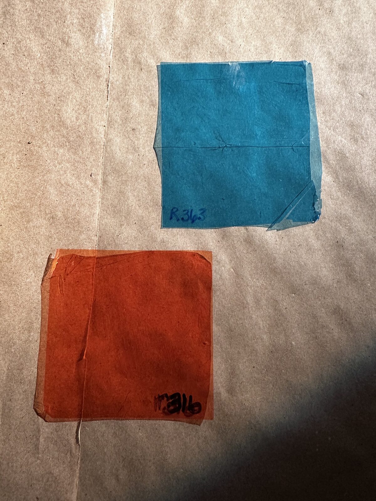 Livia Stetson · Color keys: a blue R363 swatch and a warm E316 swatch on a kraft-paper backdrop, both labeled by gel number